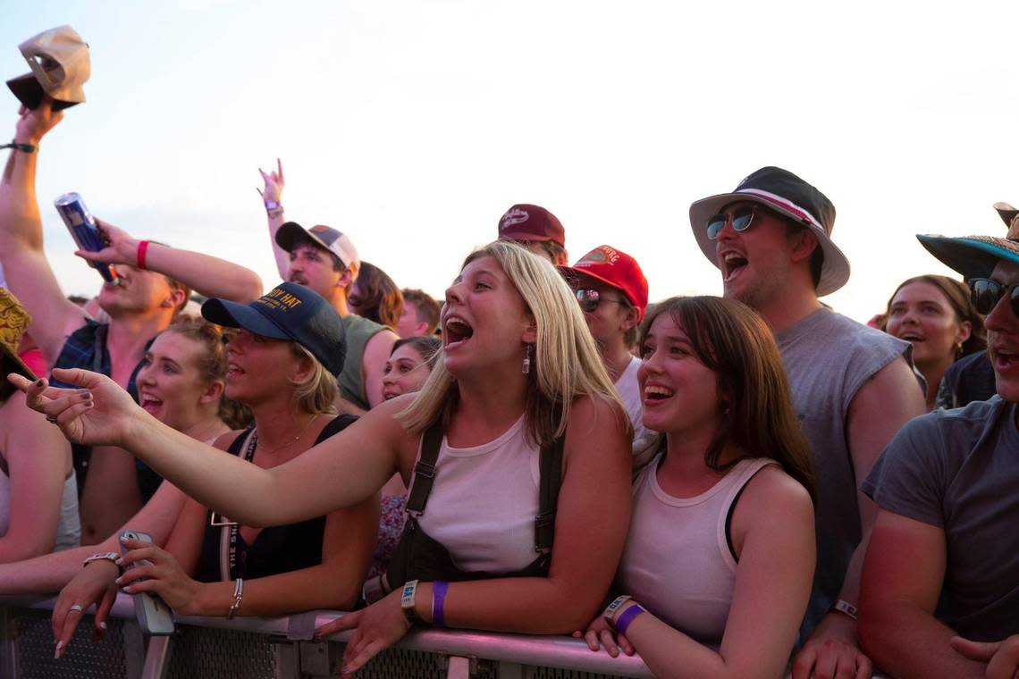Fans listen as Weezer performs during the Railbird Music Festival at Red Mile in Lexington, Ky., on Saturday, June 3, 2023.