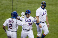 New York Mets' Michael Conforto (30) celebrates with teammates after hitting a two-run home run during the second inning of a baseball game against the Miami Marlins Saturday, Aug. 8, 2020, in New York. (AP Photo/Frank Franklin II)