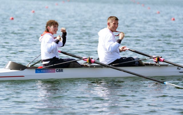 Stevenson celebrate with their gold medals after the PR2 mixed double sculls