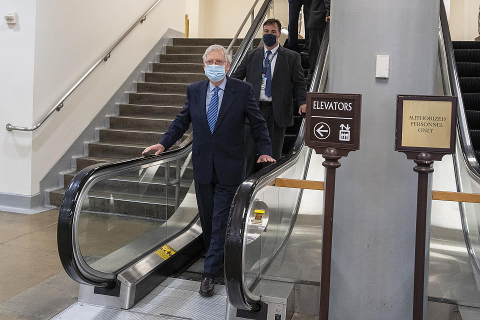 WASHINGTON, DC - OCTOBER 01: Senate Majority Leader Mitch McConnell (R-KY) walks through the Senate subway after a vote on the Senate floor at the Capitol in Washington on October 01, 2020 in Washington, DC. Senate Minority Leader Sen. Chuck Schumer forced a Senate vote to block Attorney General Barr and the Justice Department from supporting President Trump’s lawsuit to overturn the Affordable Care Act in the Supreme Court.  (Photo by Tasos Katopodis/Getty Images)