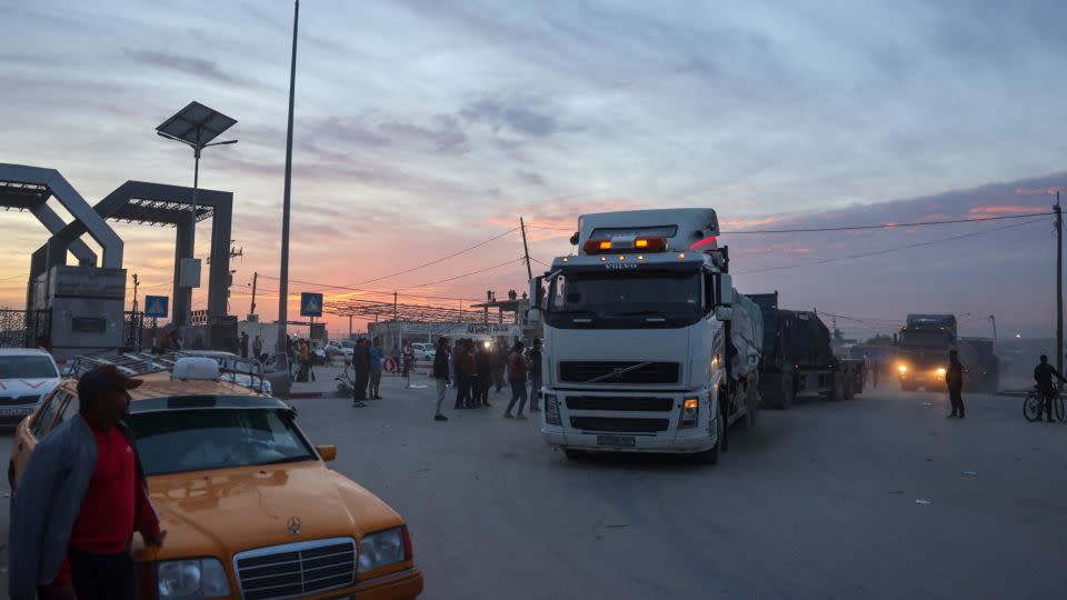 Trucks carrying humanitarian aid enter southern Gaza through the Rafah crossing on November 25, 2023. - Mohammed Abed/AFP/Getty Images