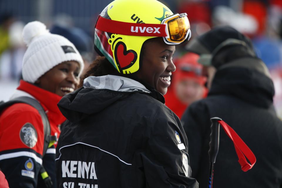 Kenya’s Sabrina Simader smiles in the finish area after completing an alpine ski, women’s World Cup super-G, in St. Moritz, Switzerland, Saturday, Dec. 9, 2017. (AP Photo/Giovanni Auletta)