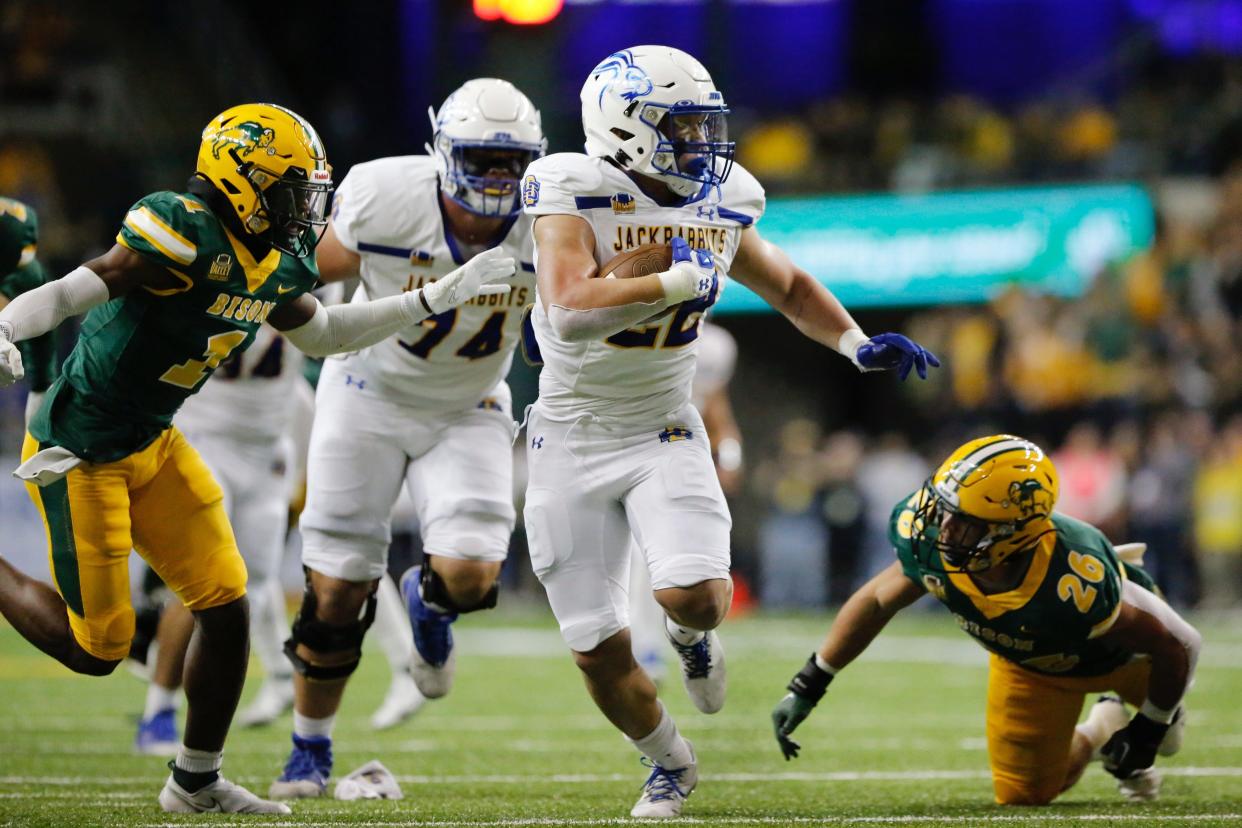 South Dakota State's Isaiah Davis makes a touchdown run against North Dakota State during their football game Saturday, Oct. 15, 2022, in Fargo.