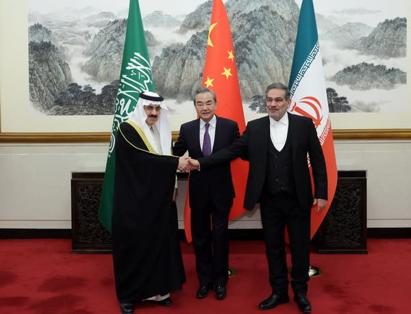 Saudi Arabia's national security adviser Musaad al-Aiban, Chinese diplomat Wang Yi and Iran's top security official Ali Shamkhani.