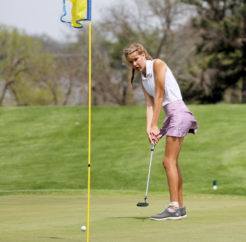 Watertown's Samantha Anderson putts on the 18th green Thursday during the Bill Scholten Invitational girls golf tournament at the Brookings Country Club.