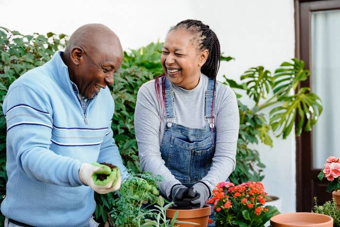 a couple gardening together