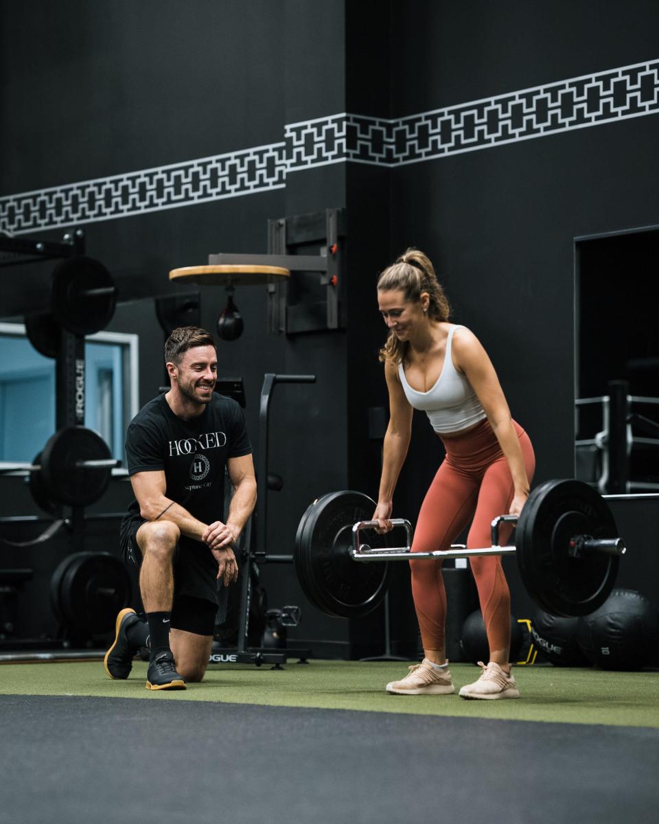 Ian Anderson training client Gabby DiFiglia of Eatontown at Hooked Boxing & Fitness in Neptune City.