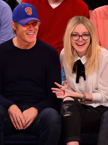 <p>James Devaney/GC Images</p> Steven Fanning and Dakota Fanning attend the Miami Heat vs New York Knicks game at Madison Square Garden on November 30, 2014 in New York City.