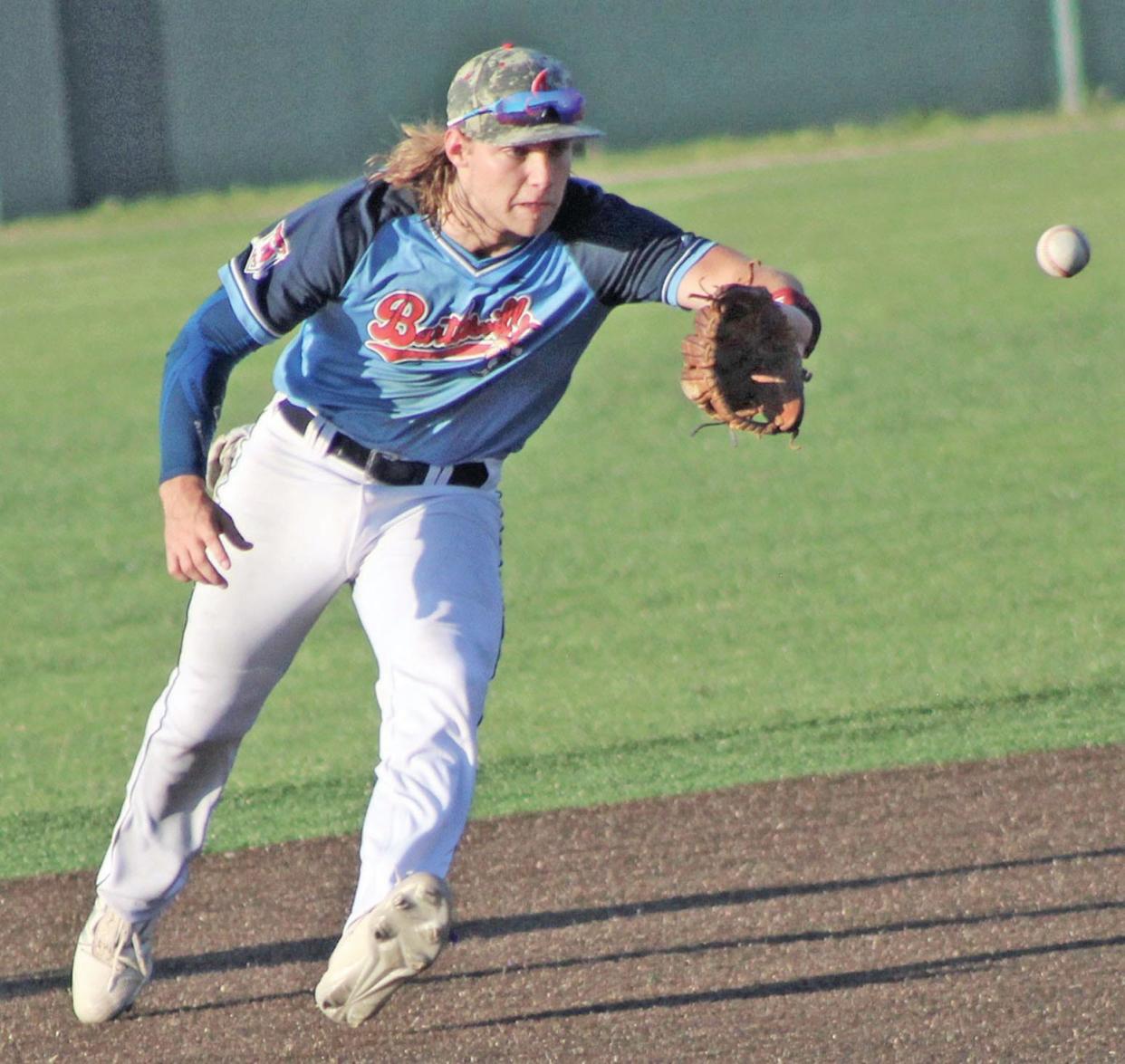 Bartlesville Doenges Ford Indians' infielder Karson Lee zeroes in on a bouncing grounder during tourney play this season at Rigdon Field.