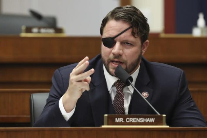 FILE - In this Sept. 17, 2020 file photo, Rep. Dan Crenshaw, R-Texas, questions witnesses during a House Committee on Homeland Security hearing on 'worldwide threats to the homeland' on Capitol Hill Washington. Crenshaw says he has undergone surgery on his eye and says he will be virtually sightless for a month. Crenshaw said in a news release Saturday, April 10, 2021, that an ophthalmologist on Thursday discovered the retina to his left eye was detaching. (Chip Somodevilla/Pool via AP, File)