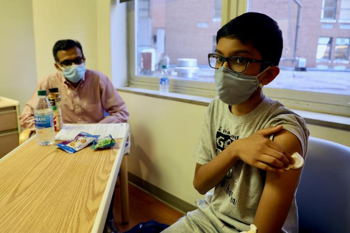Twelve-year-old Abhinav is one of the first children to join a COVID-19 vaccine trial. He got his shot on Oct. 22 at Cincinnati Children&#39;s, the same day as his father  Sharat also joined the trial.