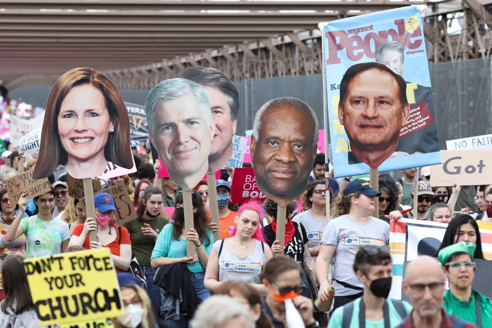 People carry cutouts of Supreme Court Justices Amy Coney Barrett, Neil Gorsuch, Brett Kavanaugh, Clarence Thomas and Samuel Alito as abortion rights protesters participate in nationwide demonstrations following the leaked Supreme Court opinion suggesting the possibility of overturning the Roe v. Wade abortion rights decision, in New York City in May. (Caitlin Ochs/Reuters)