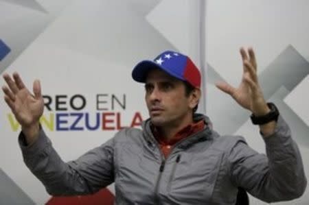 Venezuelan opposition leader and Governor of Miranda state Henrique Capriles speaks during an interview with Reuters in Caracas January 28, 2016. REUTERS/Marco Bello