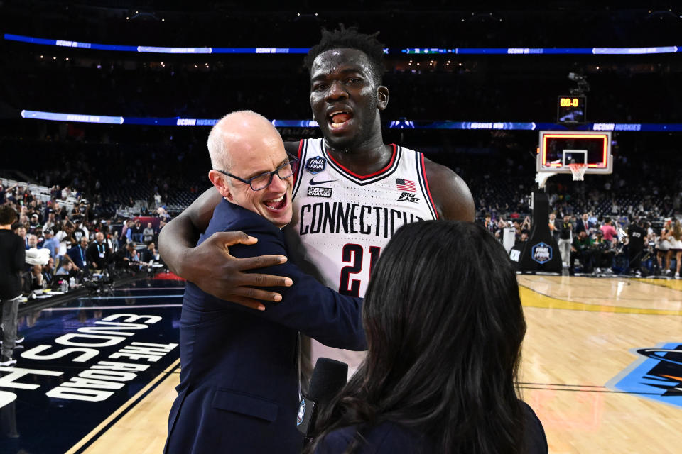 UConn coach Dan Hurley and Adama Sanogo celebrate after defeating Miami in the Final Four. (Photo by Brett Wilhelm/NCAA Photos via Getty Images)