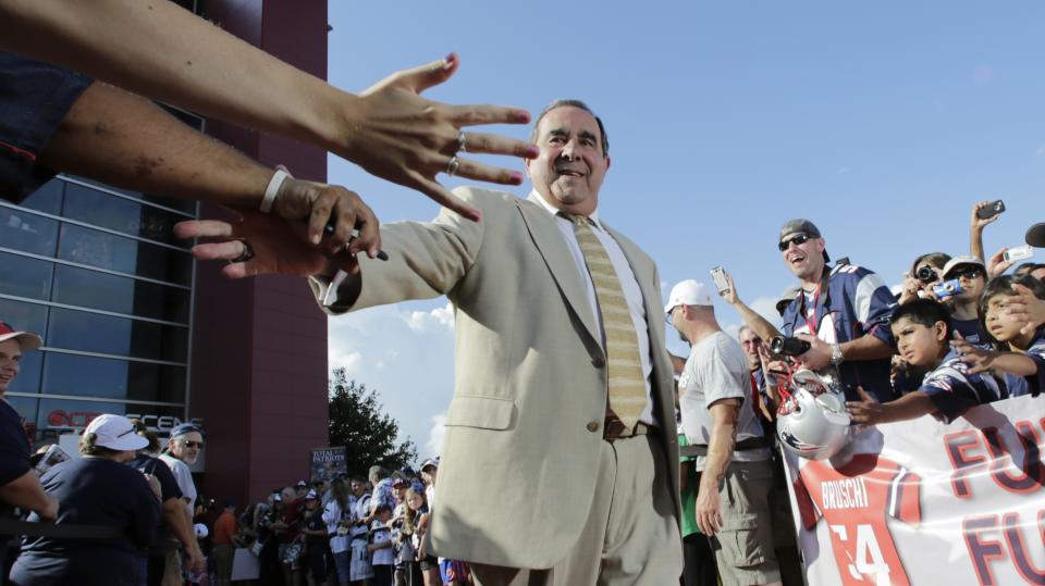 Former New England Patriots broadcaster Gil Santos died on Thursday night. Santos called games for the Patriots for 36 seasons before he retired in 2012. (AP Photo/Charles Krupa)