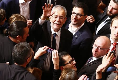 Austrian presidential candidate Alexander Van der Bellen, who is supported by the Greens, arrives at an election party in Vienna, Austria, December 4, 2016. REUTERS/Leonhard Foeger