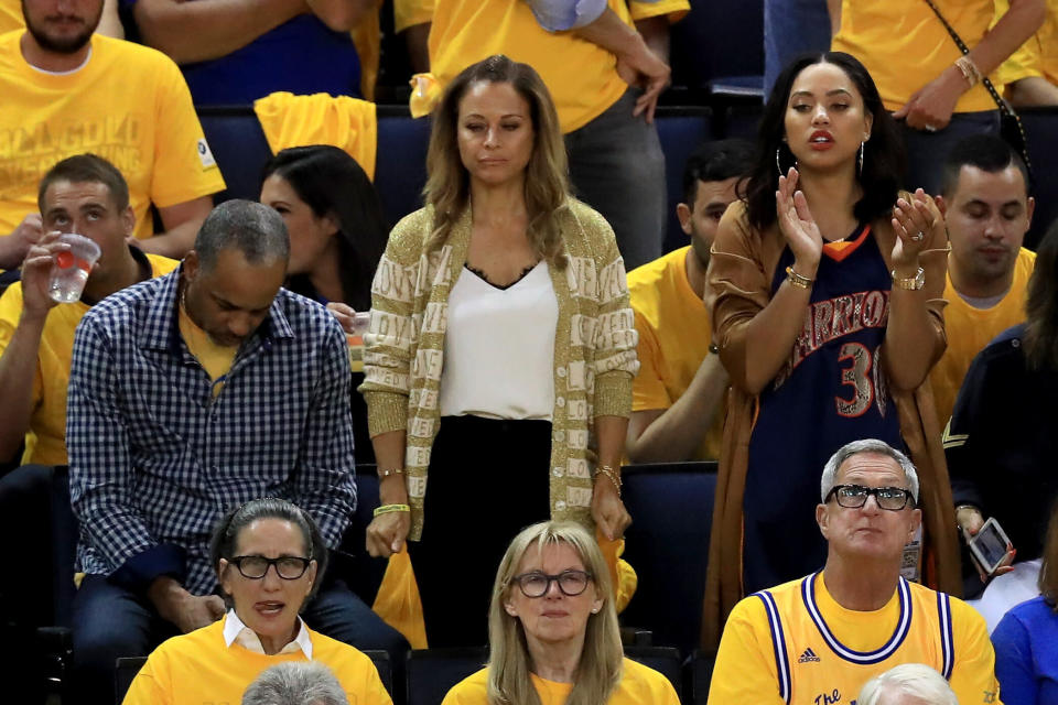 OAKLAND, CA - JUNE 12:  (L-R) Dell and Sonya Curry, parents of Stephen Curry #30 of the Golden State Warriors sit with his wife Ayesha Curry in the stands during Game 5 of the 2017 NBA Finals between the Golden State Warriors and the Cleveland Cavaliers at ORACLE Arena on June 12, 2017 in Oakland, California. NOTE TO USER: User expressly acknowledges and agrees that, by downloading and or using this photograph, User is consenting to the terms and conditions of the Getty Images License Agreement.  (Photo by Ronald Martinez/Getty Images)