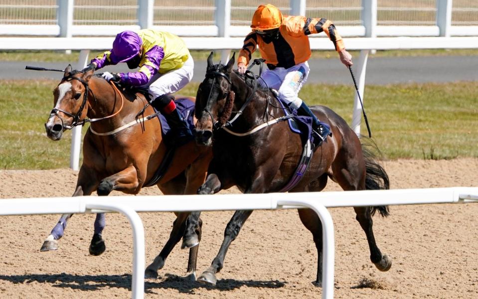  James Sullivan riding Zodiakos (R, orange) win The Betway Welcome Back British Racing Handicap at Newcastle Racecourse on June 01, 2020 in Newcastle upon Tyne - Alan Crowhurst/Getty Images