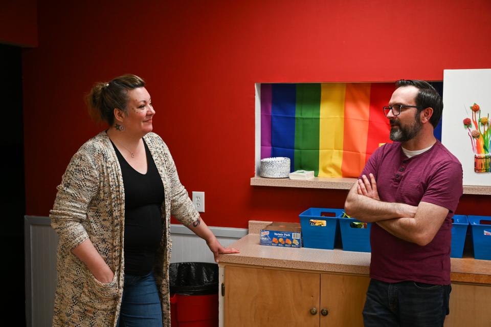 Christine Straight, left, a board member for the Great Falls LGBTQ+ Center, talks with President Mathew Pipinich on June 10, 2024.