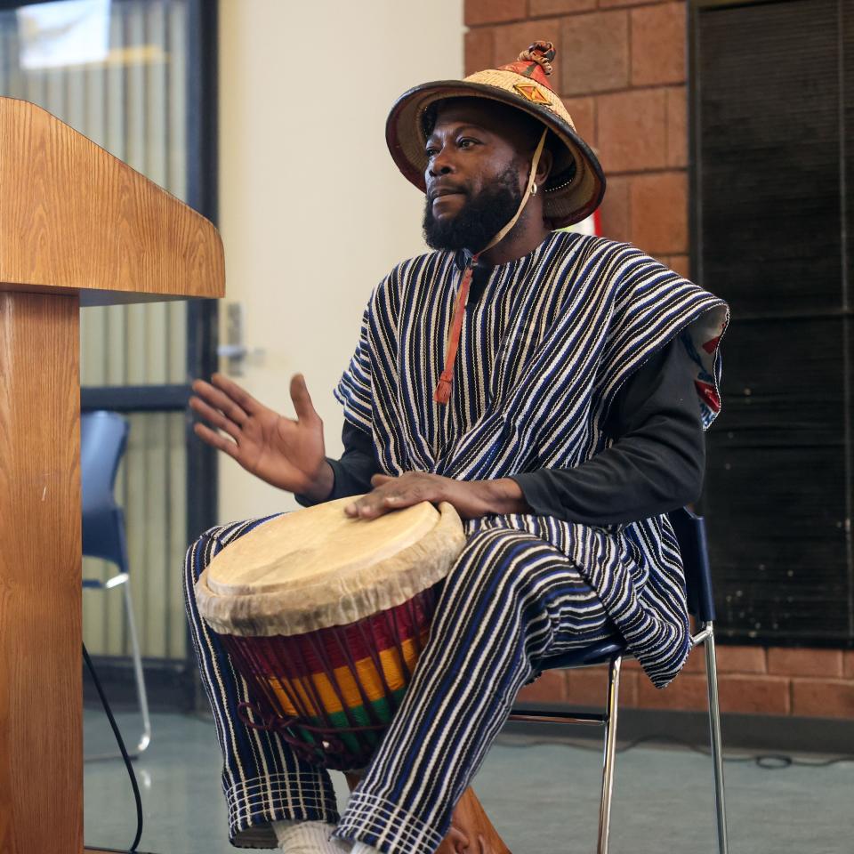 Lakina “Donny” Ando from the African country Ghana gives a drumming demonstration at the Joy Park Neighborhood Federation’s Black History Month program held Saturday in Akron.