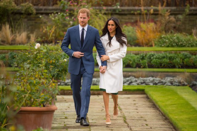 Prince Harry and Meghan Markle in the Sunken Garden at Kensington Palace (Dominic Lipinski/PA)