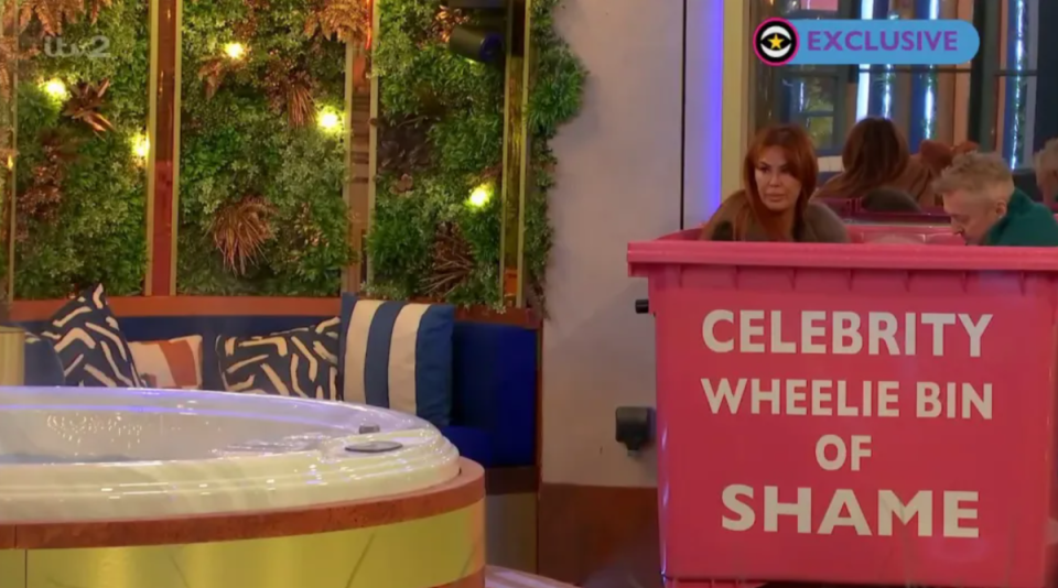 Lauren and Louis get put into the ‘Celebrity Wheelie Bin of Shame’ as punishment (ITV)