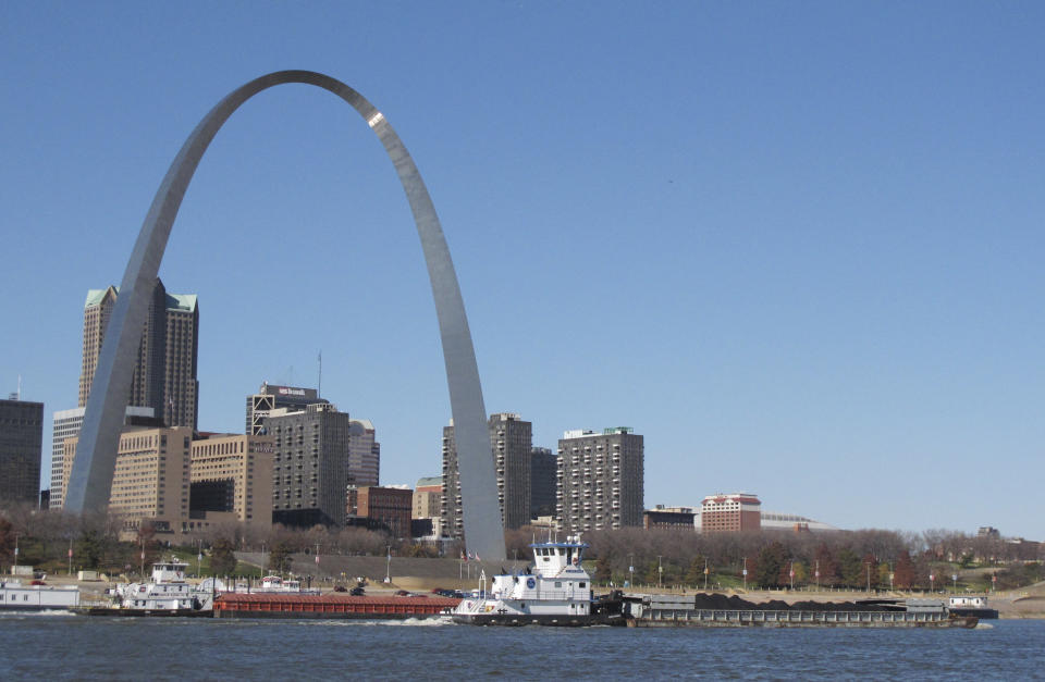 Two barges head north on the Mississippi River past St. Louis on Monday, Nov. 12, 2012, as seen from East St. Louis, Ill. Missouri Gov. Jay Nixon and the barge industry are pressing the federal government to take steps to keep enough water flowing on the drought-ridden Missouri and Mississippi rivers to avert a potential "economic disaster," given the Mississippi's importance as a commerce corridor. Winter typically is a low-water period on the two big rivers, but the situation is more dire this year with many points long the waterways at or near historic lows. (AP Photo/Jim Suhr)