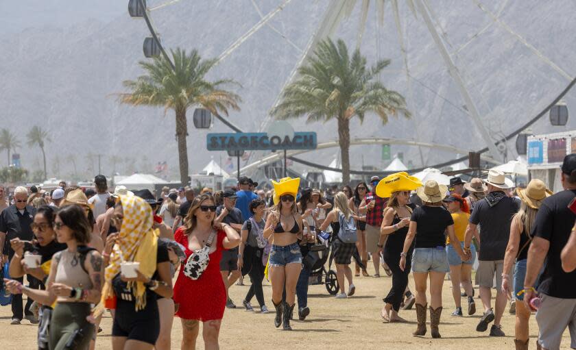 Indio, CA - April 26: Thousands of country music fans arrive at Stagecoach and some make a dash for the best viewing position on the first day of Stagecoach Country Music Festival at the Empire Polo Club in Indio Friday, April 26, 2024. (Allen J. Schaben / Los Angeles Times)