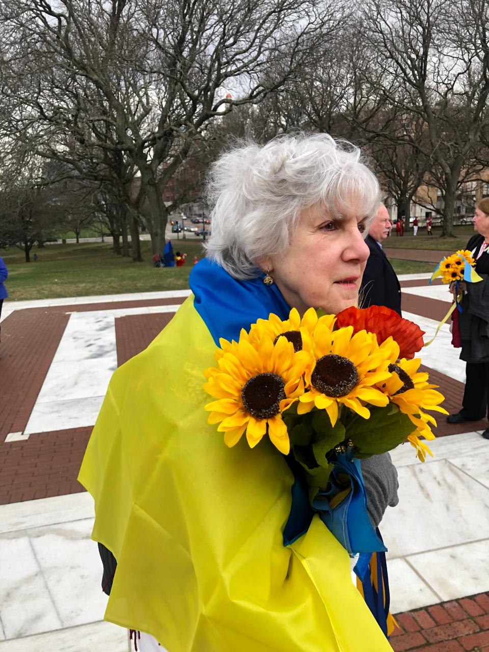 Irene Shewchuk, a member of St. Michael Ukrainian Orthodox Church in Woonsocket, attends Saturday's rally at the State House with fellow parishioners to show support for Ukraine.