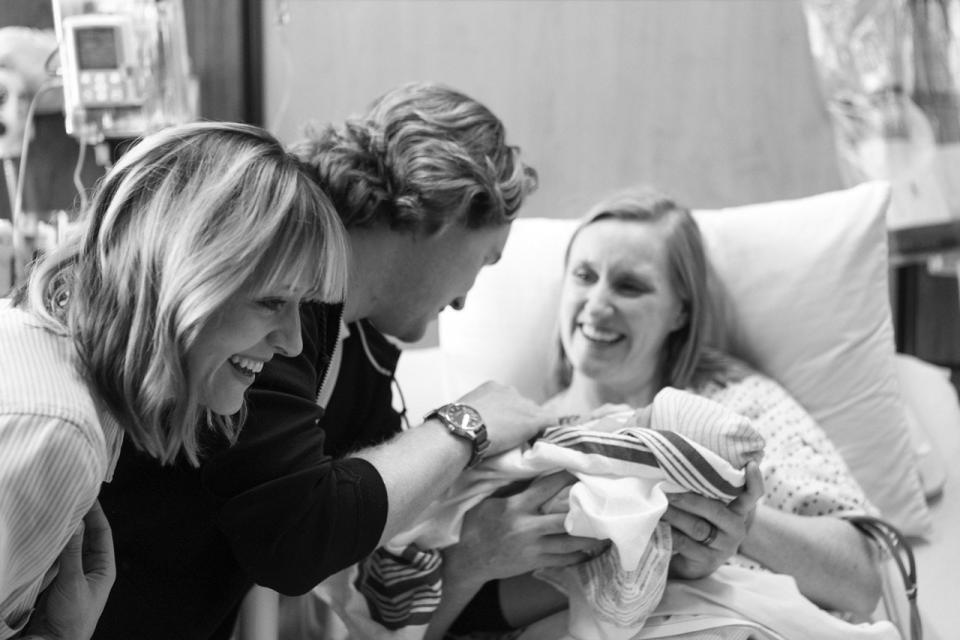 Kelsey Nixon and her husband greet their baby, Nora