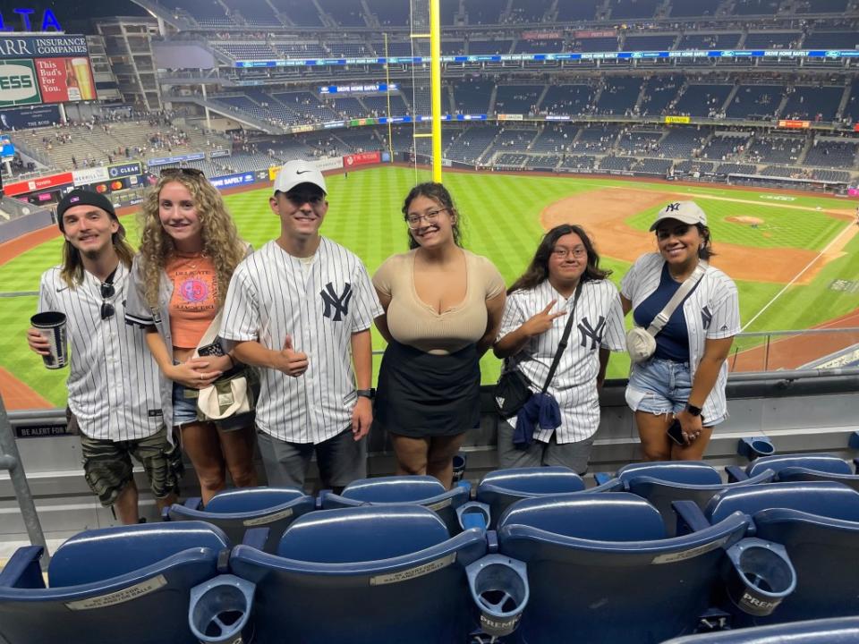 The exchange students took the subway to Yankee Stadium to watch a baseball game. American Exchange Project