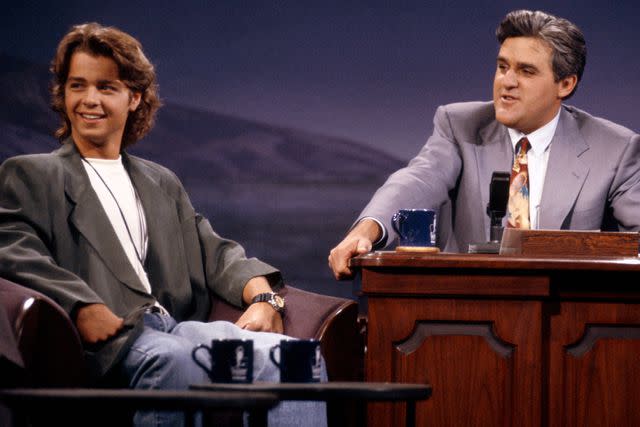<p>Jeff Zawitowski/NBCU Photo Bank/NBCUniversal via Getty </p> Joey Lawrence and Jay Leno in 1992
