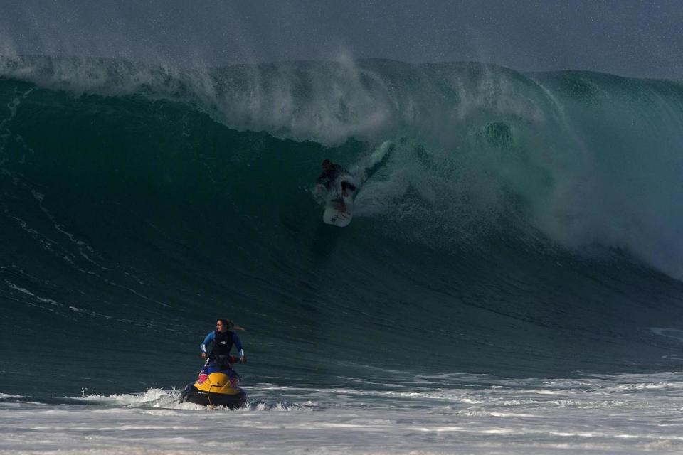 Specialist | Cotton rides a wave at Nazare in 2015 Photo: AFP/Getty Images