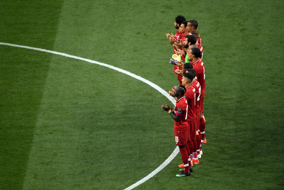 Liverpool players observe a moments applause in memory of Jose Antonio Reyes who died earlier today during the UEFA Champions League Final at the Wanda Metropolitano, Madrid.