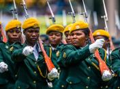 <p>Soldiers march as Zimbabwe’s new interim President reviews the honour guard for the first time after being sworn-in at the National Sports Stadium in Harare, on Nov. 24 2017. (Photo: Jekesai Njikizana/AFP/Getty Images) </p>