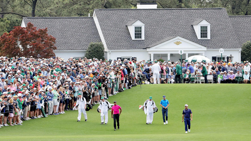 Massive galleries of fans turned out to see Tiger Woods' remarkable comeback at Augusta. Pic: Getty