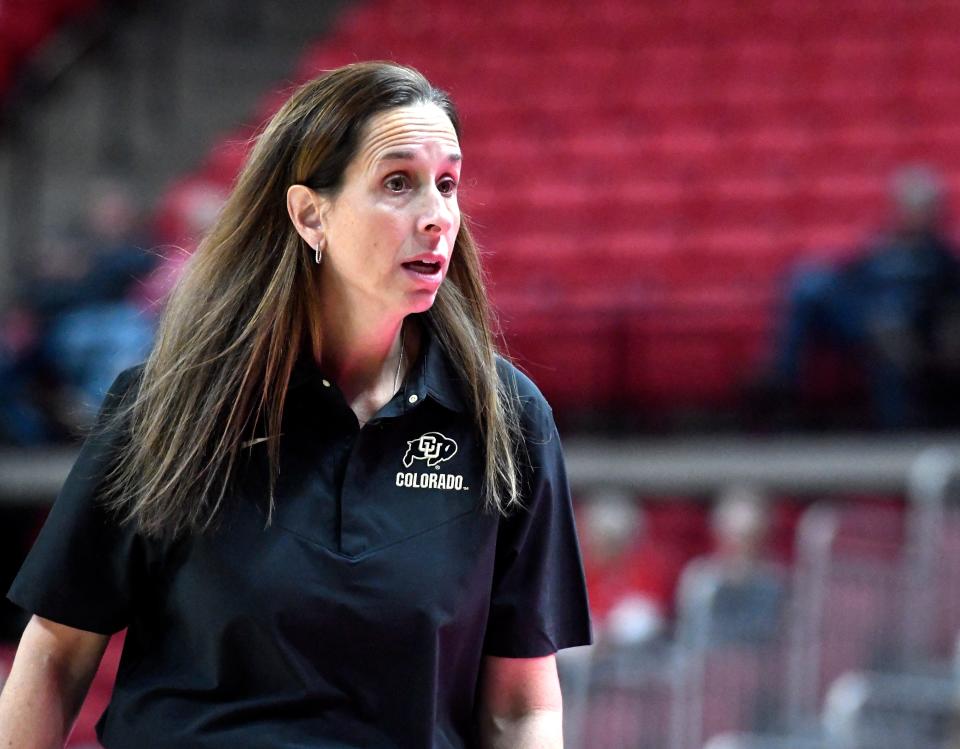 Colorado's head women basketball coach JR Payne walks along the sidelines against Texas Tech in a preseason WNIT game, Wednesday, Nov. 16, 2022, at United Supermarkets Arena.
