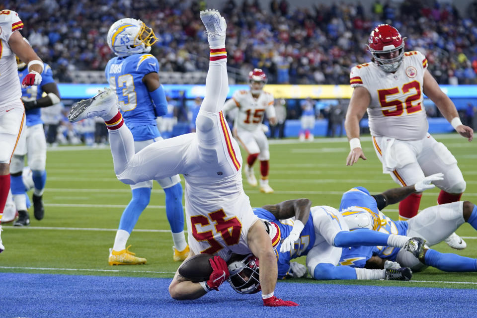 Kansas City Chiefs fullback Michael Burton scores a touchdown during the first half of an NFL football game against the Los Angeles Chargers, Thursday, Dec. 16, 2021, in Inglewood, Calif. (AP Photo/Marcio Jose Sanchez)