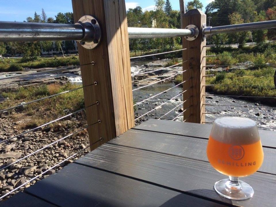 A Belgian-style pale ale with a view of the Ammonoosuc River at Schilling Beer Co. in Littleton, New Hampshire.