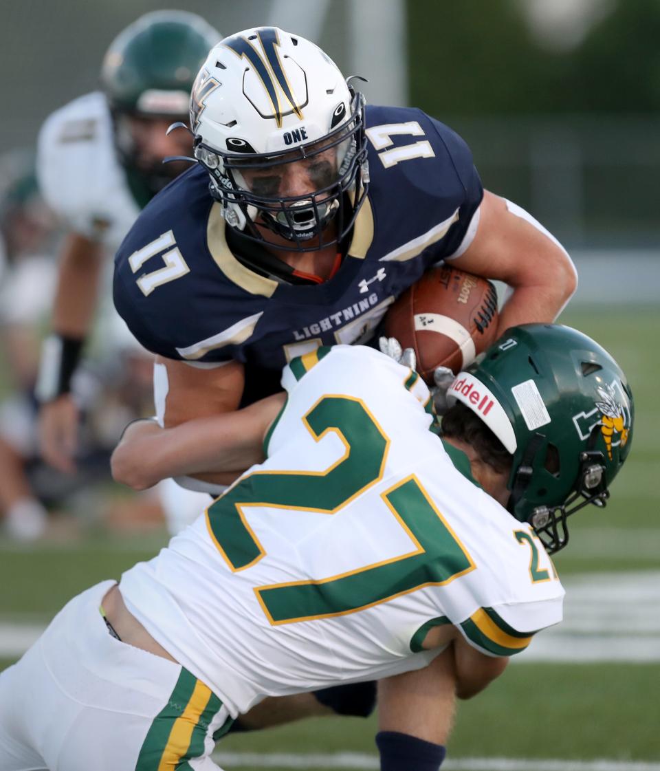 Appleton North High School's Jack Robinson (17) is tackled by Green Bay Preble High School's Ty Gerard (27) during their football game Thursday, August 25, 2022, in Appleton, Wis. Appleton North won 42-0.
Lori Fahrenholz for USA Today Network-Wisconsin