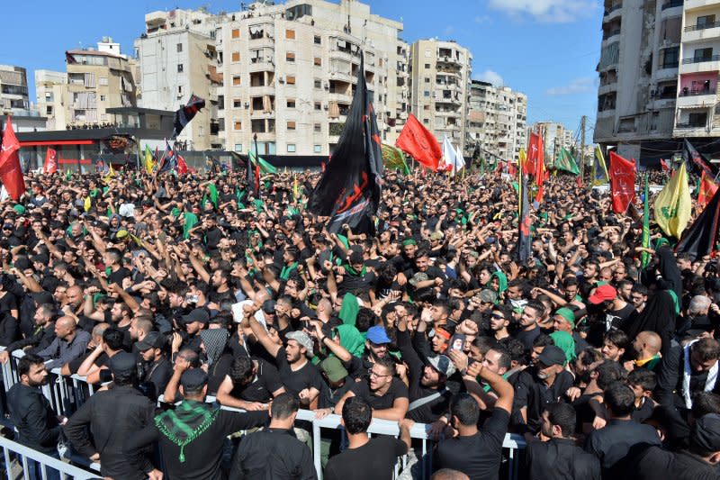 Lebanese Shiite Muslim supporters of Hezbollah shout slogans as they listen to the speech of Hezbollah leader Hassan Nasrallah during Ashura Day in southern suburb of Beirut, Lebanon, Oct. 1, 2017. File Photo by Wael Hamzeh/EPA-EFE