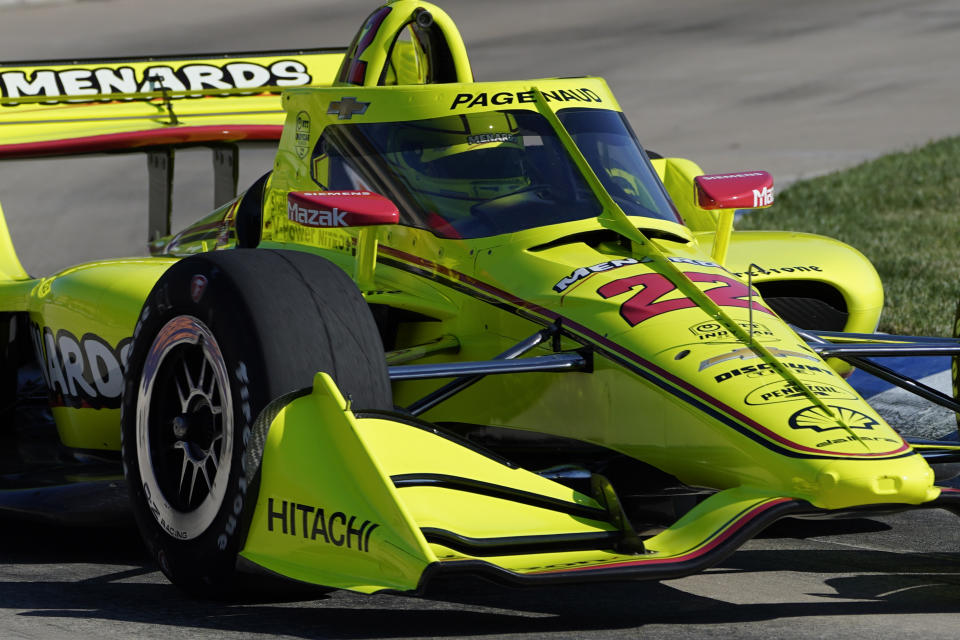 Simon Pagenaud, of France, practices for the IndyCar Detroit Grand Prix auto racing doubleheader on Belle Isle in Detroit, Friday, June 11, 2021. (AP Photo/Paul Sancya)