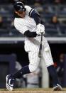 Apr 1, 2019; Bronx, NY, USA; New York Yankees right fielder Aaron Judge (99) hits a double during the seventh inning against the Detroit Tigers at Yankee Stadium. Mandatory Credit: Adam Hunger-USA TODAY Sports