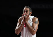 Iran's Hamed Haddadi reacts during men's basketball game between Czech Republic and Iran at the 2020 Summer Olympics, Sunday, July 25, 2021, in Saitama, Japan. (AP Photo/Charlie Neibergall)