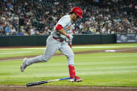 St. Louis Cardinals' Nolan Arenado flips his bat away on an infield groundout against the Arizona Diamondbacks during the ninth inning of a baseball game Sunday, April 14, 2024, in Phoenix. (AP Photo/Ross D. Franklin)