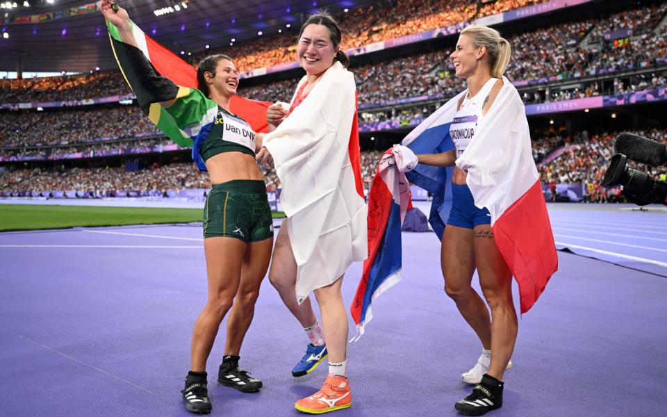 Silver medallist South Africa's Jo-Ane van Dyk, Gold medallist Japan's Haruka Kitaguchi and Bronze medallist Czech Republic's Nikola Ogrodnikova