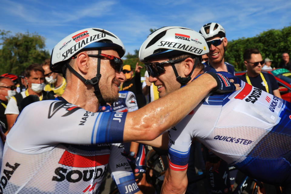 BOURGENBRESSE FRANCE  JULY 20 Stage winner Kasper Asgreen of Denmark and Team Soudal  Quick Step R celebrates the victory with his teammate Dries Devenyns of Belgium L after the stage eighteen of the 110th Tour de France 2023 a 1849km stage from Motiers to BourgenBresse  UCIWT  on July 20 2023 in BourgenBresse France Photo by Martin Divisek  PoolGetty Images