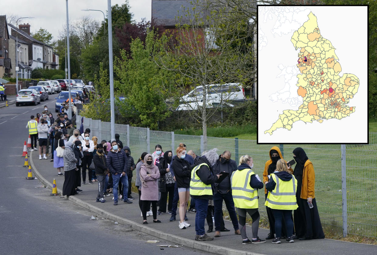 People queuing for COVID-19 vaccinations in Bolton on Tuesday amid the spread of the Indian variant in parts of England. (PA)