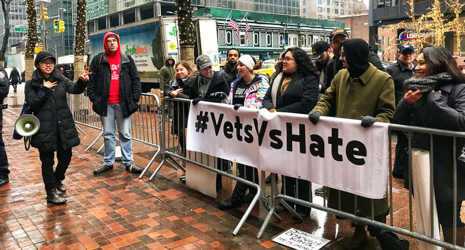 Tereza Lee, left, leads a group of immigration activists outside the office of Sen. Chuck Schumer. (Photo: Caitlin Dickson/Yahoo News)