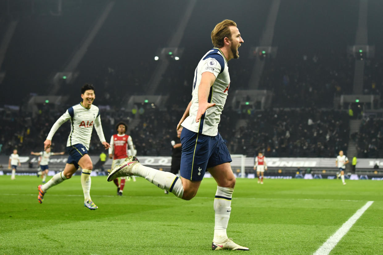 Tottenham Hotspur's Harry Kane celebrates scoring their second goal against Arsenal with Son Heung-min.